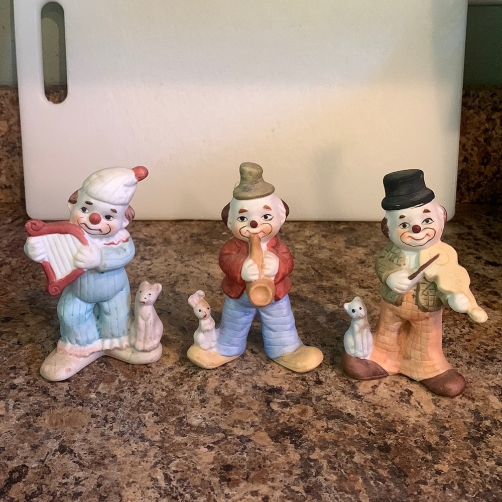 Clown Trio playing instruments